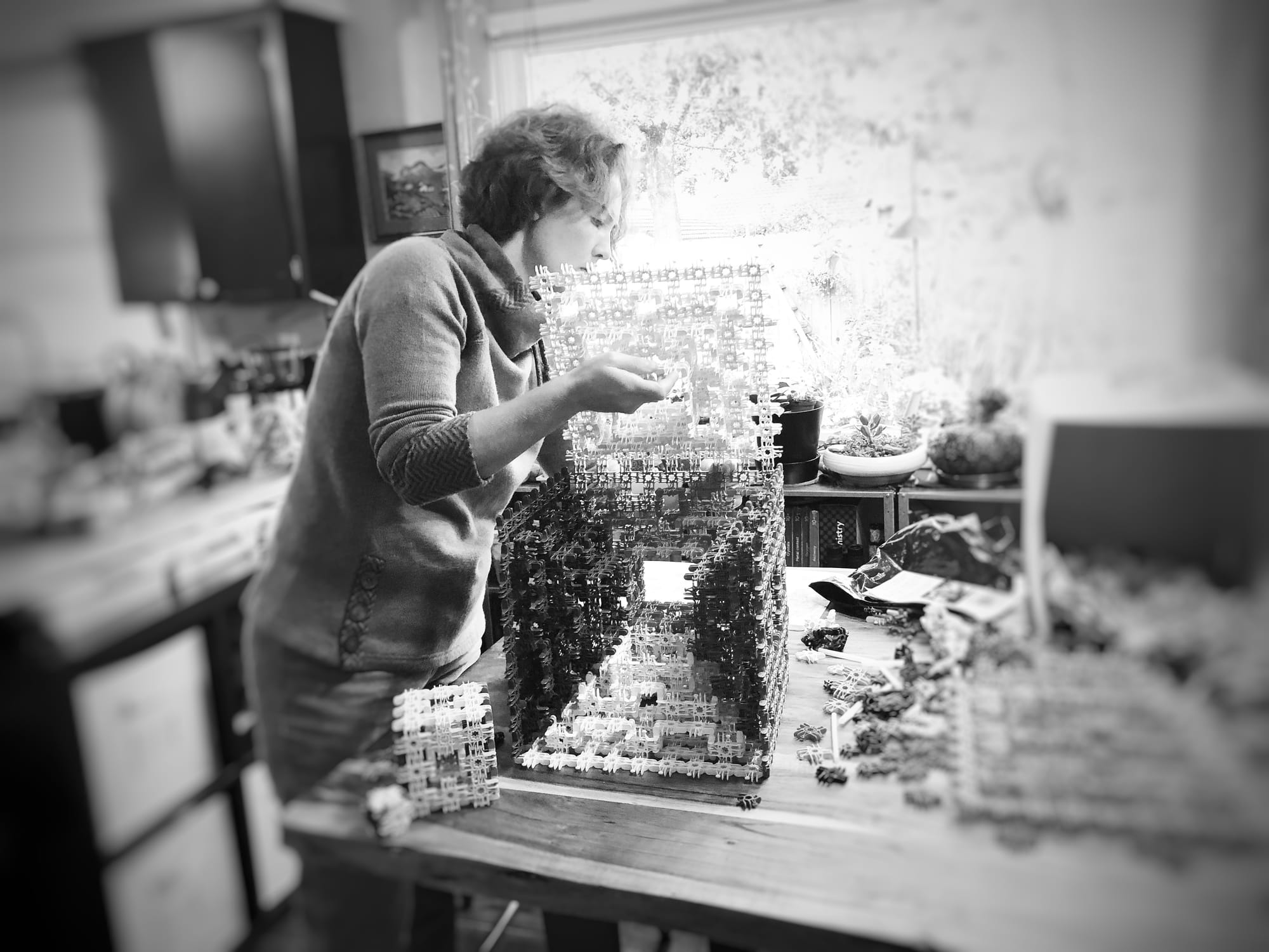 a woman building the cube