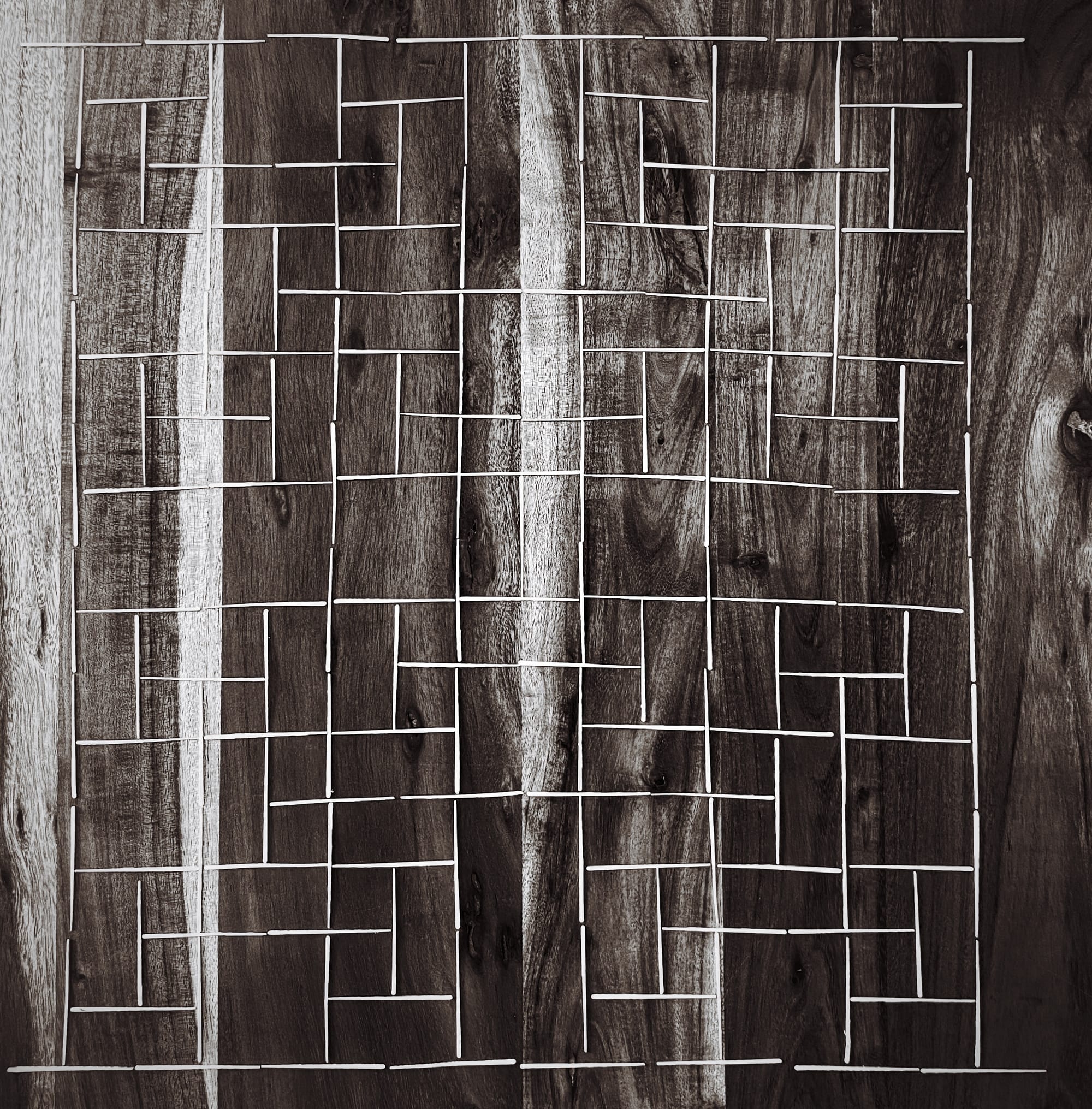 the toothpick fractal made of toothpicks on a table